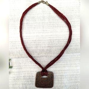 Necklace - Brass on Burgundy Silk Material chain